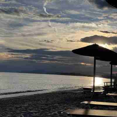 Sunset view at Nisos Beach Bar Fanari on Arogi Beach